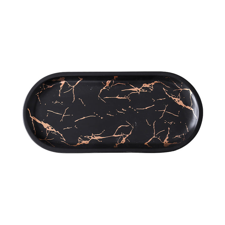 Oval serving tray made of melamine with glossy marble look and raised edge