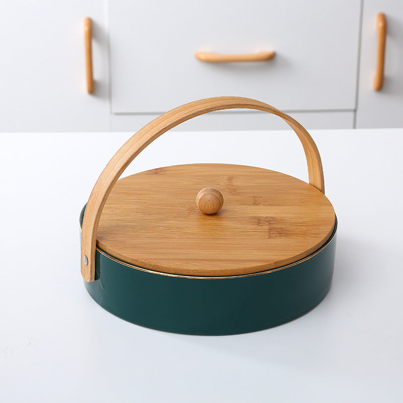 Round serving and storage set with bamboo handle and three-part interior divider