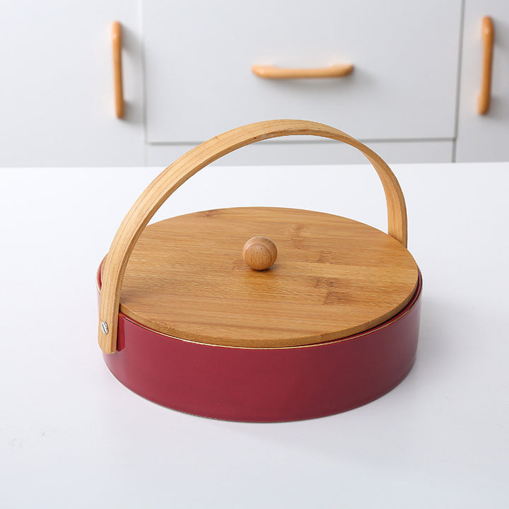 Round serving and storage set with bamboo handle and three-part interior divider