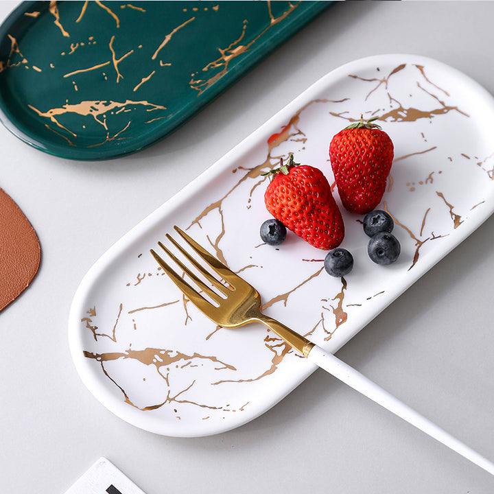 Oval serving tray made of melamine with glossy marble look and raised edge