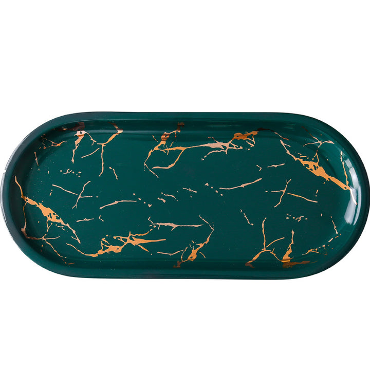 Oval serving tray made of melamine with glossy marble look and raised edge