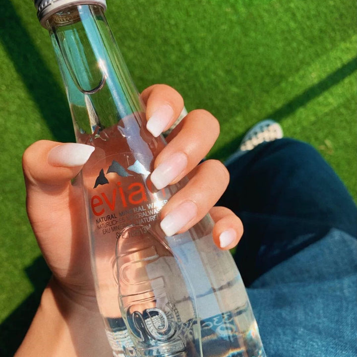 Artificial nails in modern French Tip design Kalsten