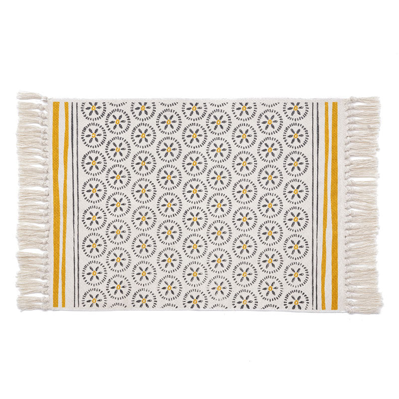 Flat woven cotton runner with fringes and graphic medallion pattern