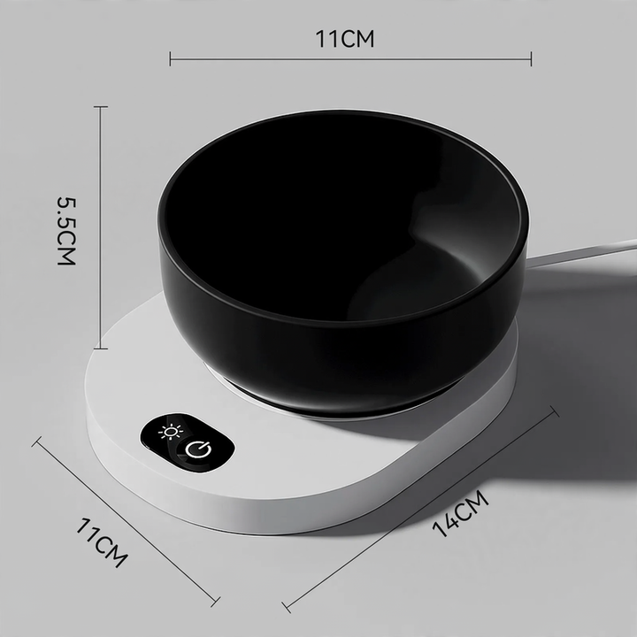 Heated drinking and feeding bowl for pets