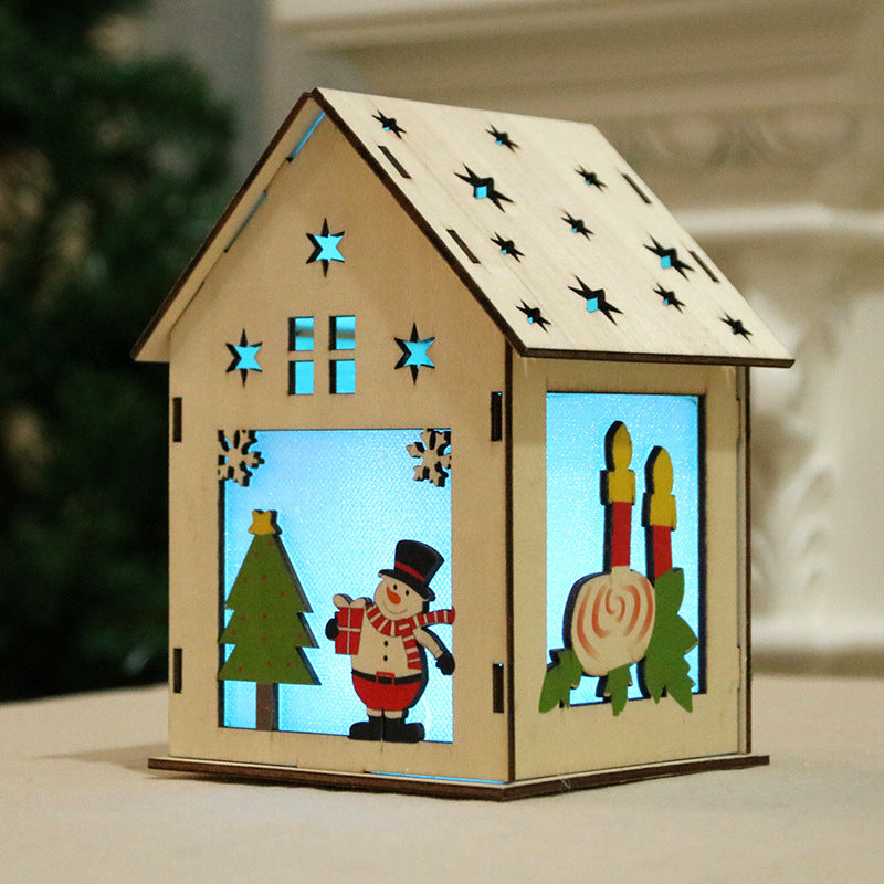 Illuminated wooden Christmas house, decorative