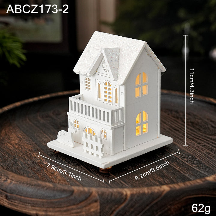 Illuminated wooden house for Christmas decoration
