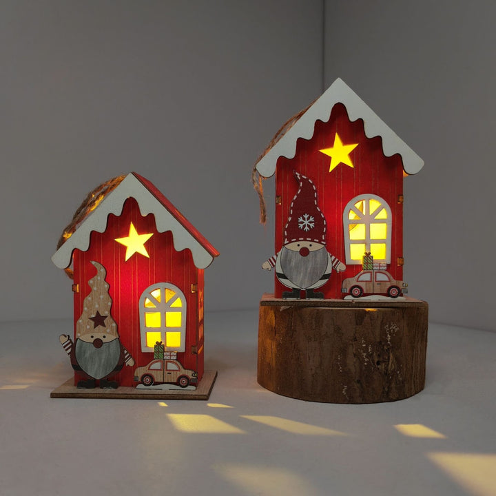 Illuminated wooden house for Christmas decoration