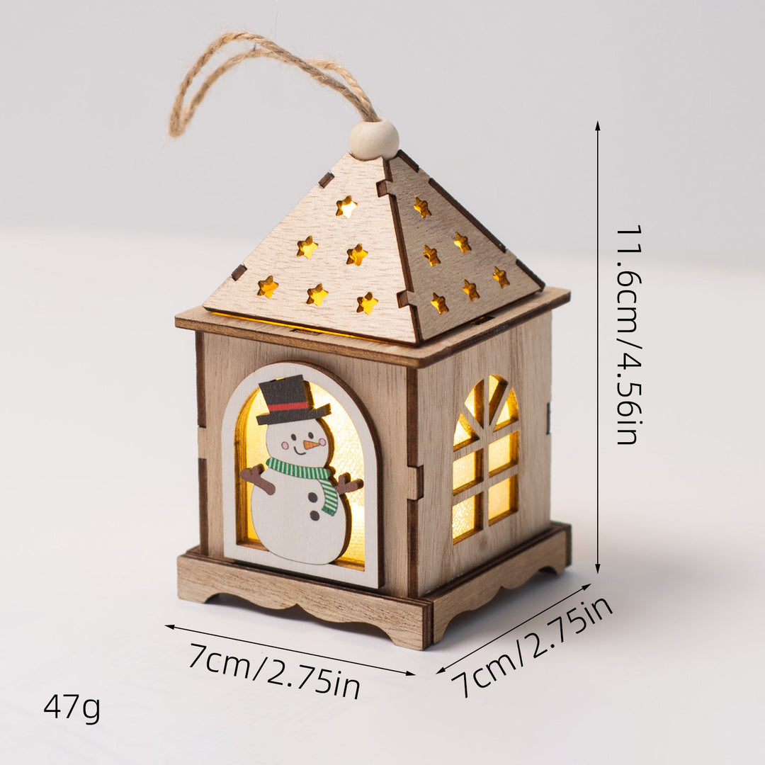 Illuminated wooden house as Christmas decoration