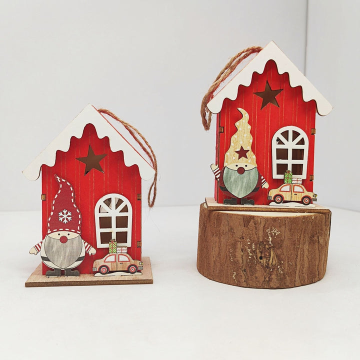 Illuminated wooden house for Christmas decoration