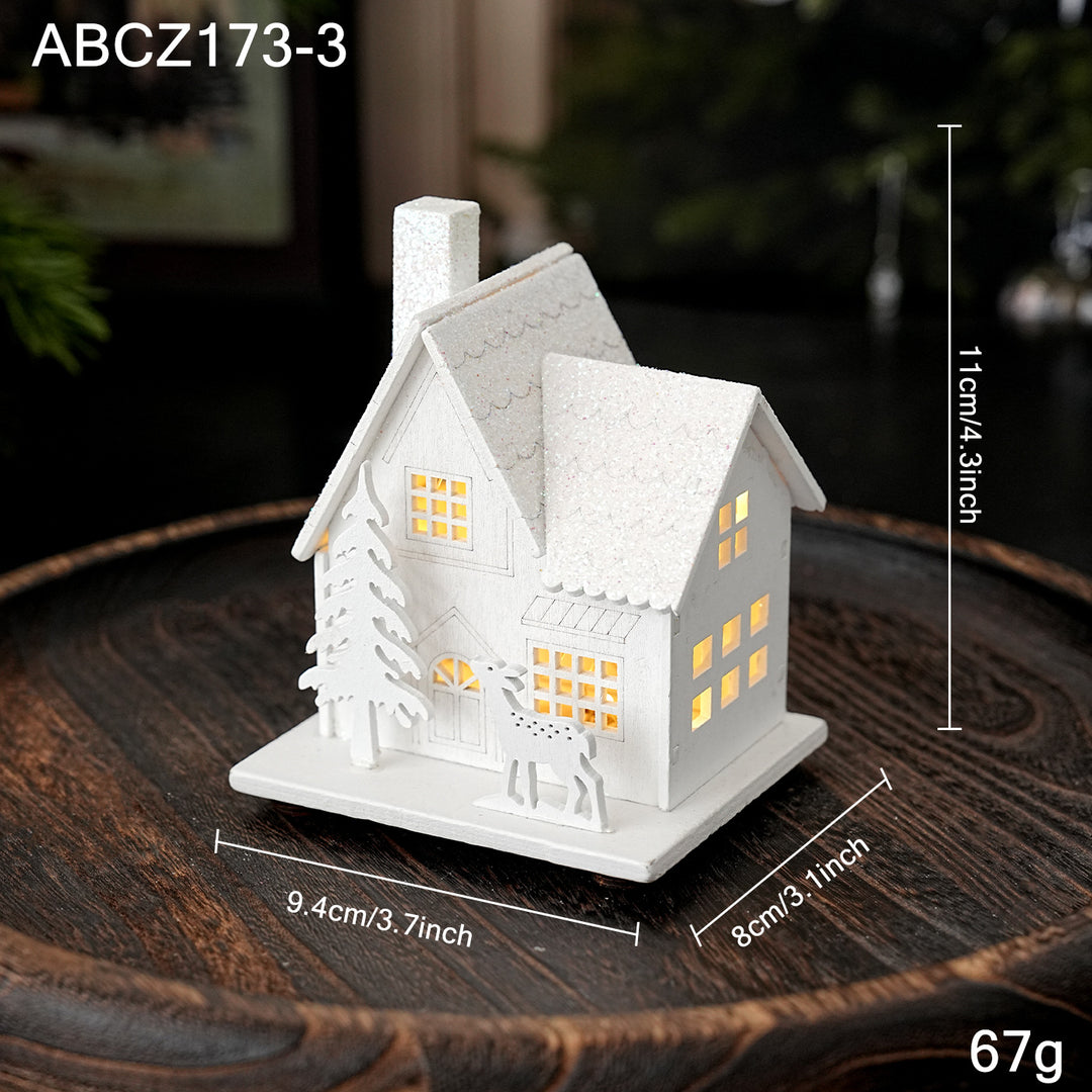 Illuminated wooden house for Christmas decoration