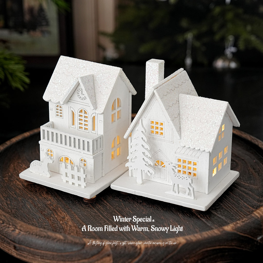 Illuminated wooden house for Christmas decoration