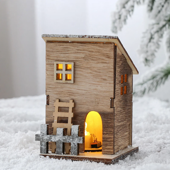 Illuminated wooden Christmas house in Scandinavian style
