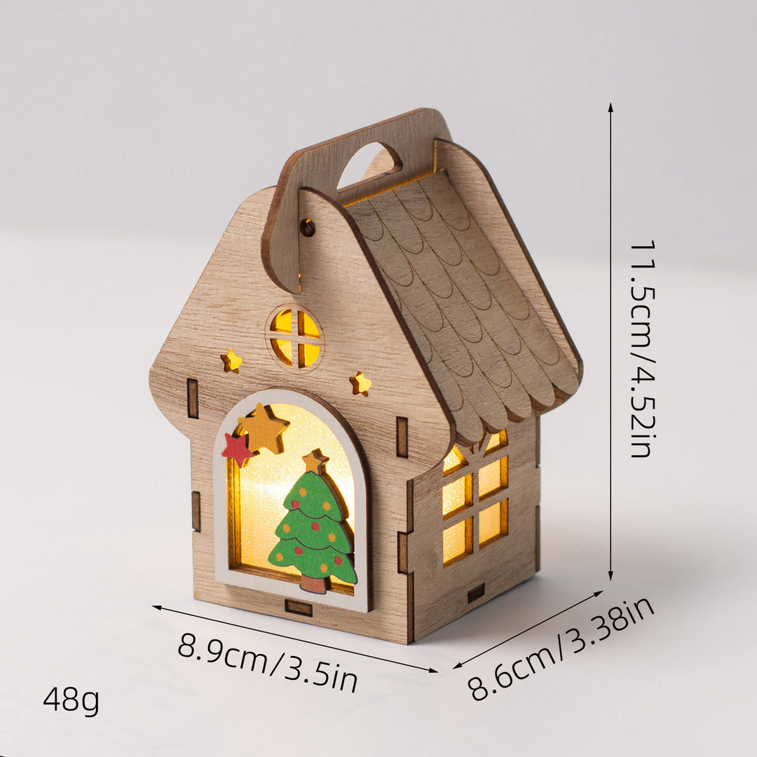 Illuminated wooden house as Christmas decoration