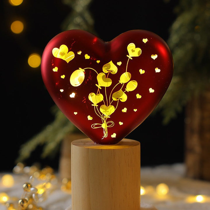 Illuminated glass decoration for Christmas