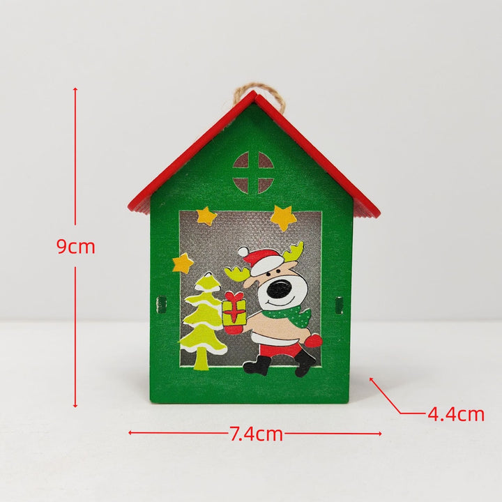 Illuminated wooden house for Christmas decoration
