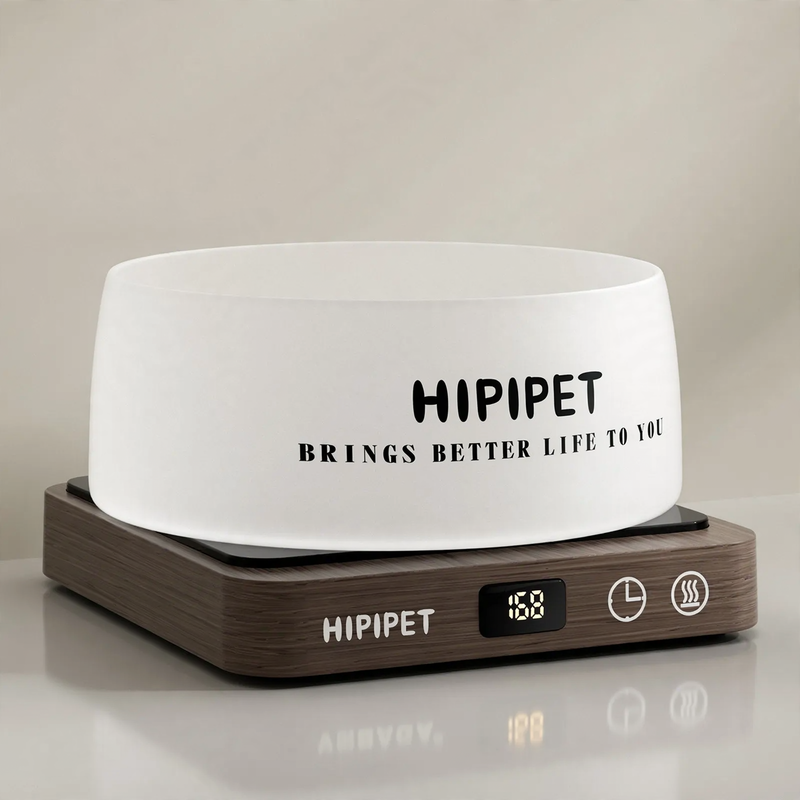 Heated drinking and feeding bowl for pets