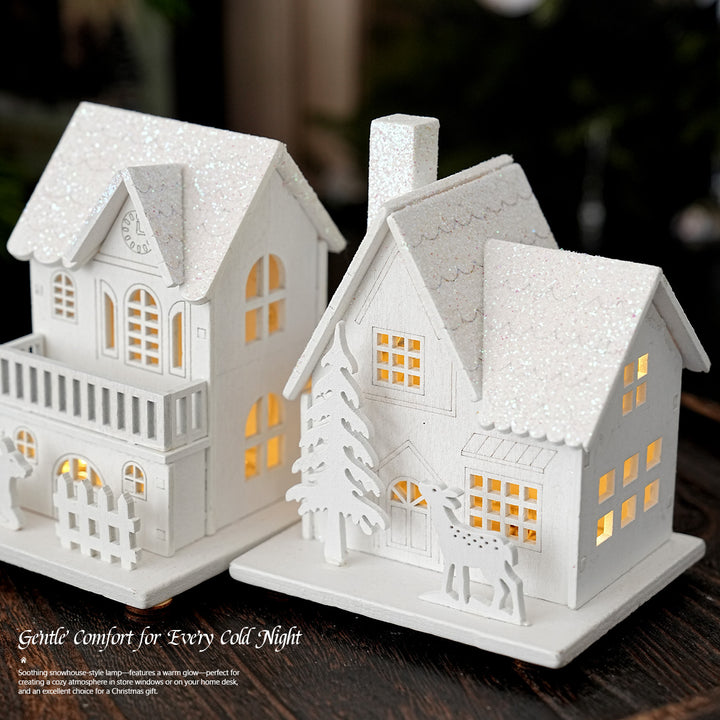 Illuminated wooden house for Christmas decoration