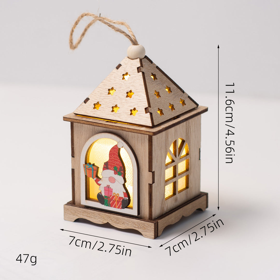 Illuminated wooden house as Christmas decoration