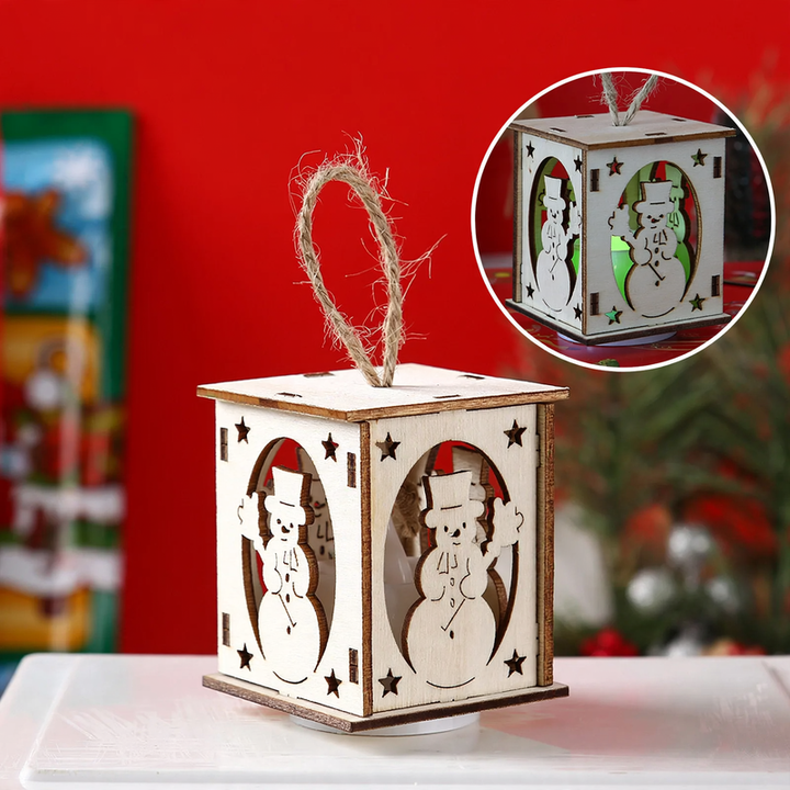 Illuminated wooden house as Christmas decoration