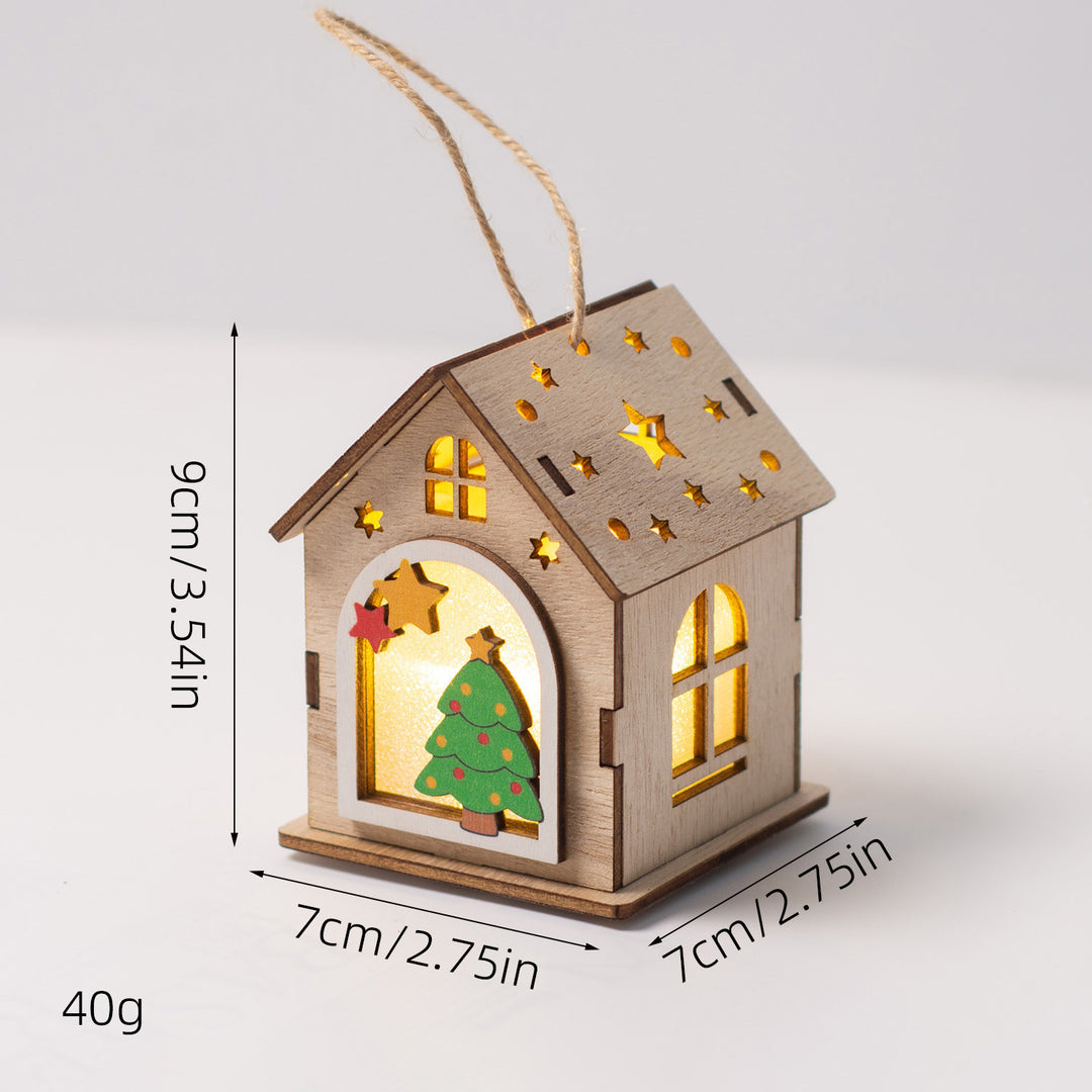 Illuminated wooden house as Christmas decoration