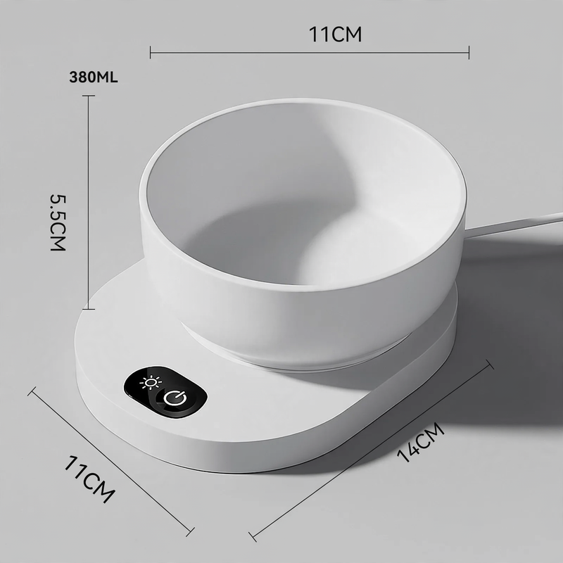 Heated drinking and feeding bowl for pets