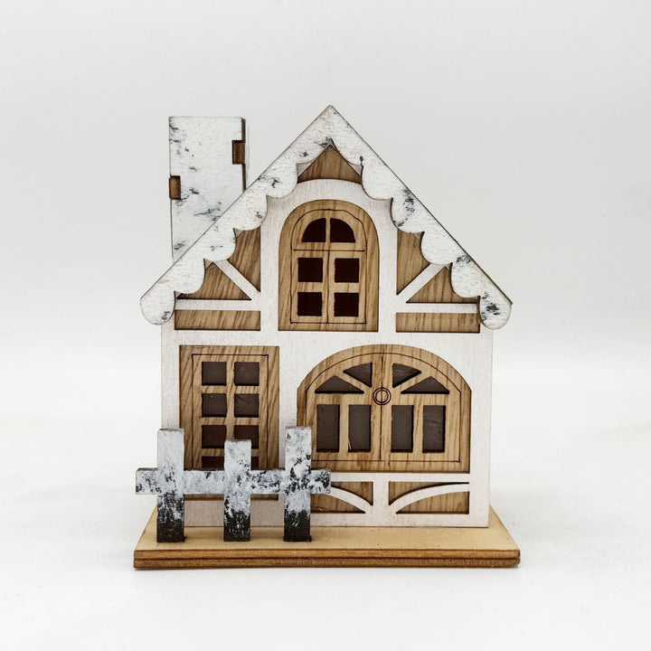 Illuminated wooden Christmas house with LED