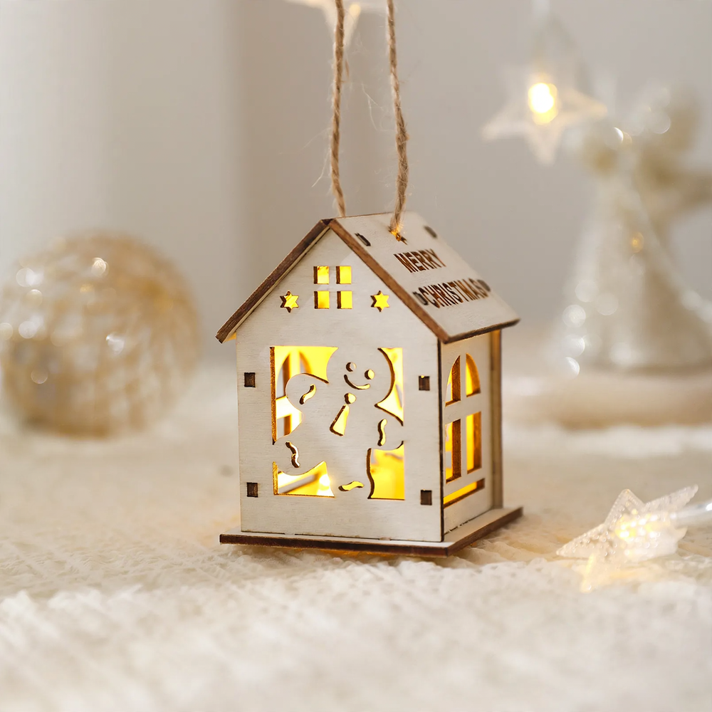 Illuminated wooden house as Christmas decoration