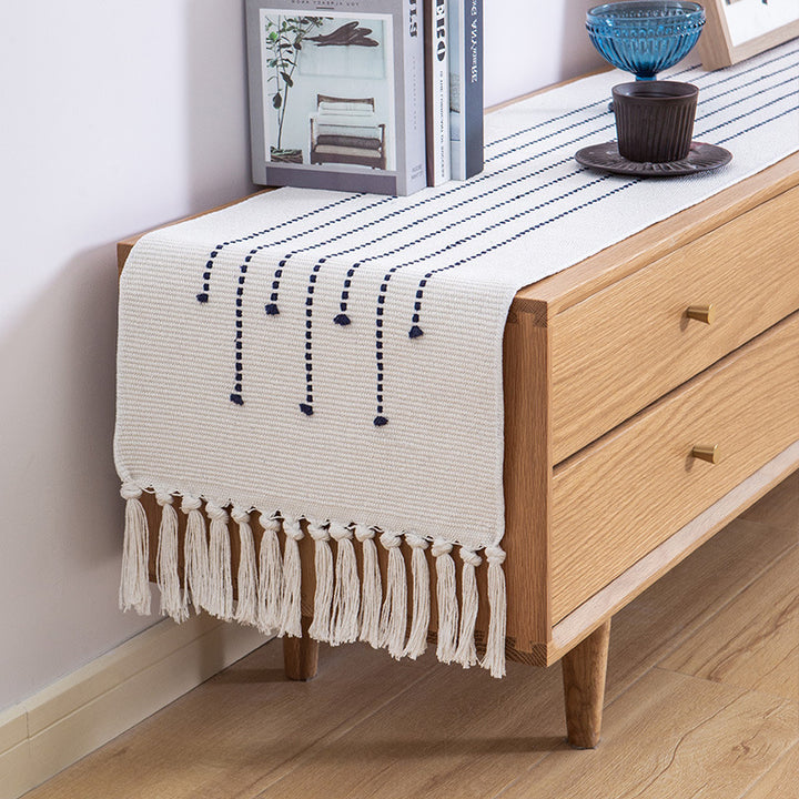 Decorative web runner for dining table with hand-tufted dots and fringes