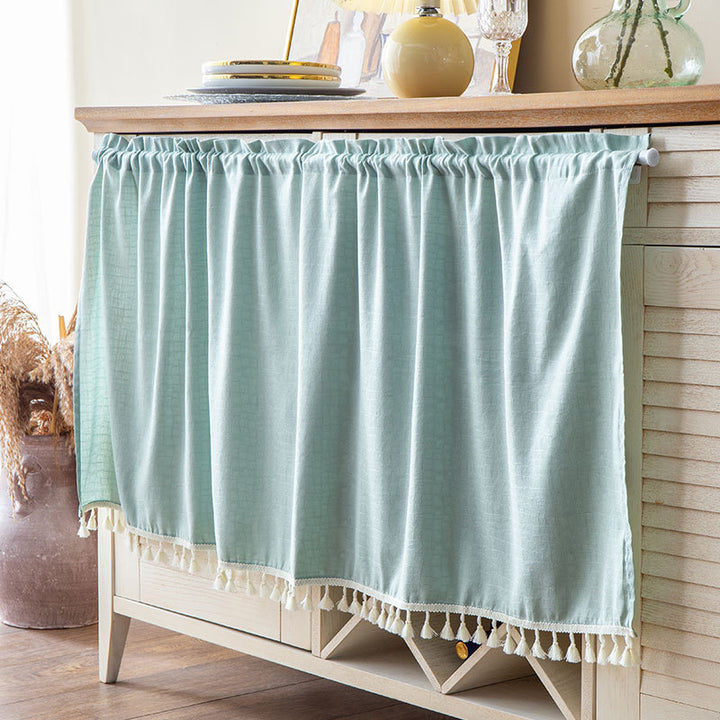 Short curtain with tassel border and rod passage