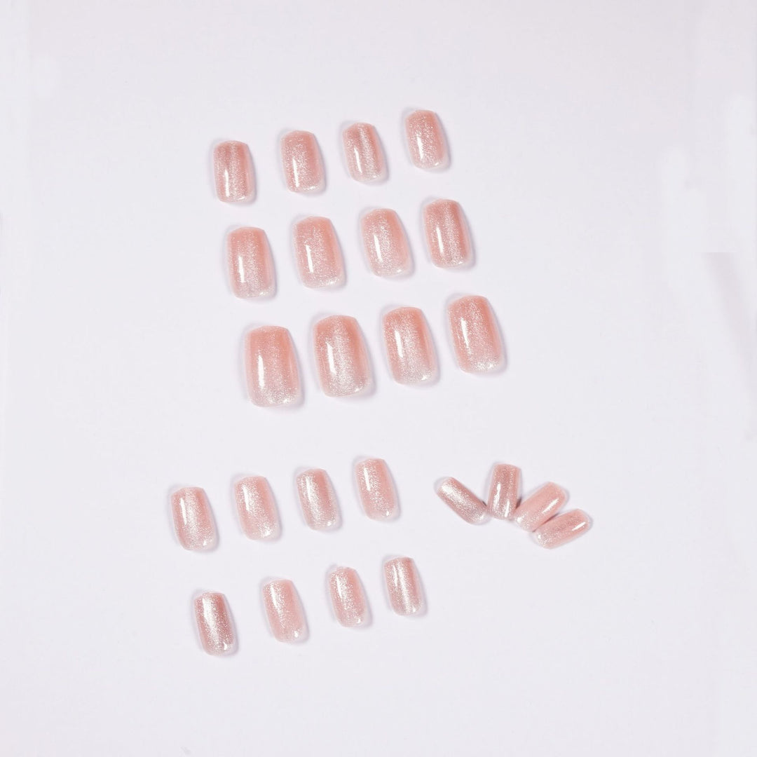 Artful nail art with a gentle glitter effect and elegant finish Kalsten