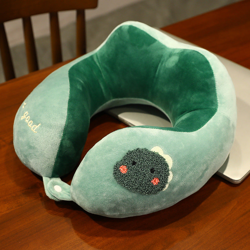 Plush neck travel pillow with ergonomic U-shape, snap button closure and adorable embroidery