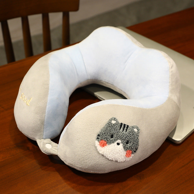 Plush neck travel pillow with ergonomic U-shape, snap button closure and adorable embroidery