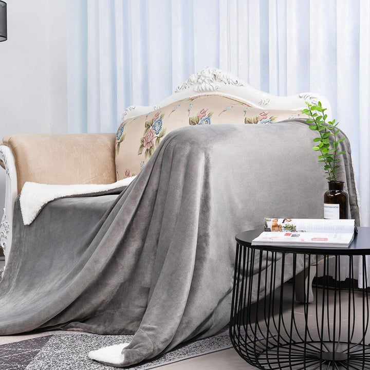 Women's reversible blanket in modern design with soft plush Kalsten
