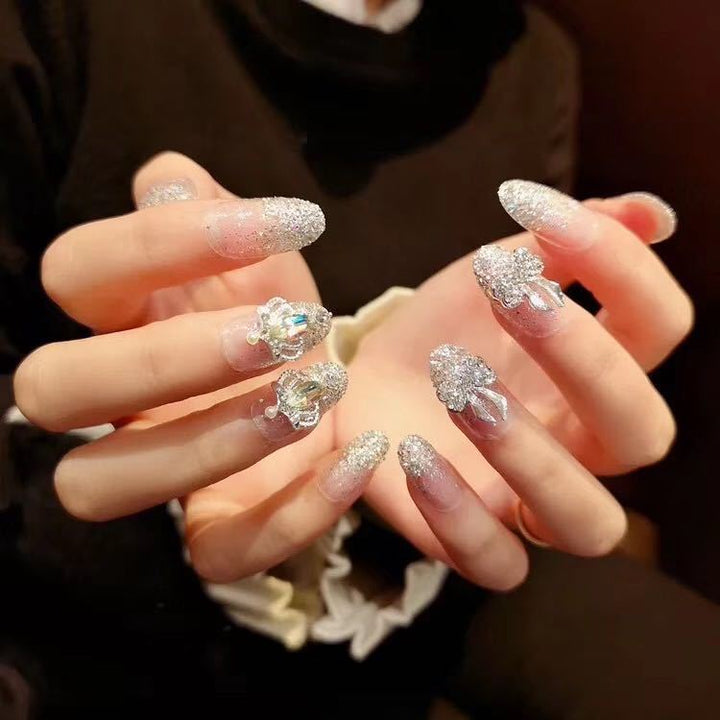 Nail art with sparkling rhinestone and glitter accents Kalsten