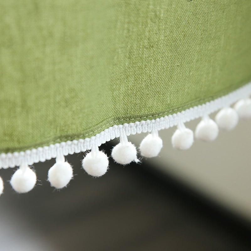 Light hamam towel with fine gingham check, hanging loops and fringes