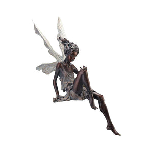 Kalsten | Statue of sitting fairy in the garden