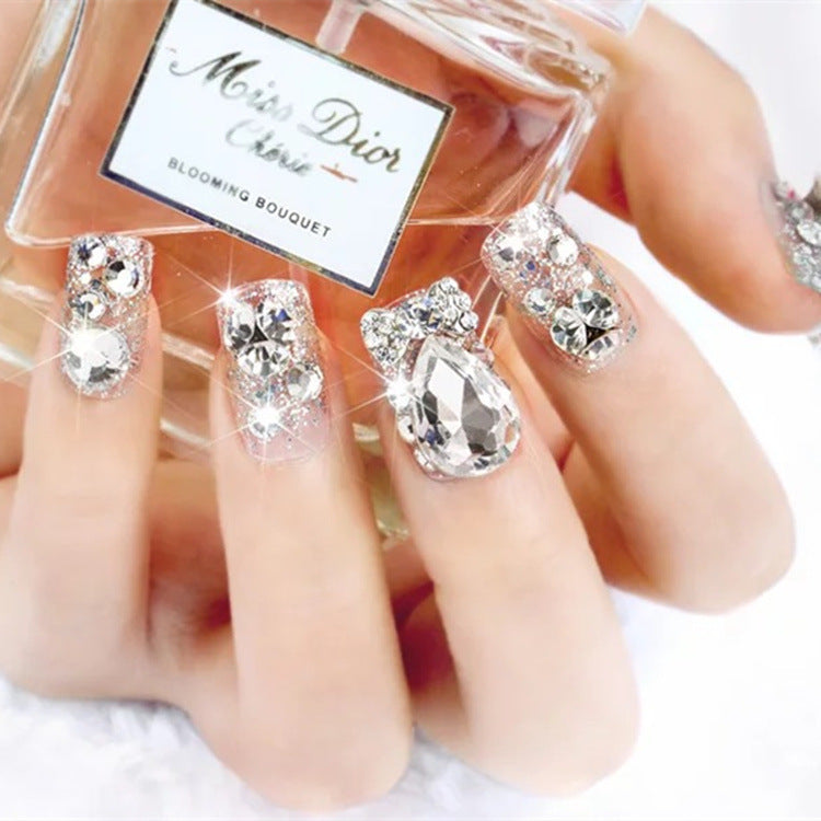 Nail art with glamorous rhinestone and glitter design Kalsten