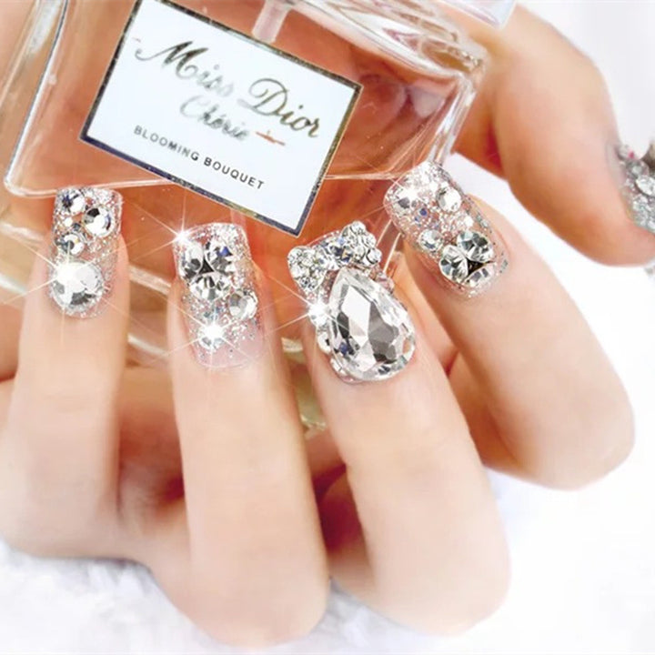 Nail art with glamorous rhinestone and glitter design Kalsten