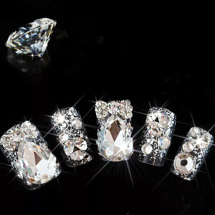 Nail art with glamorous rhinestone and glitter design Kalsten