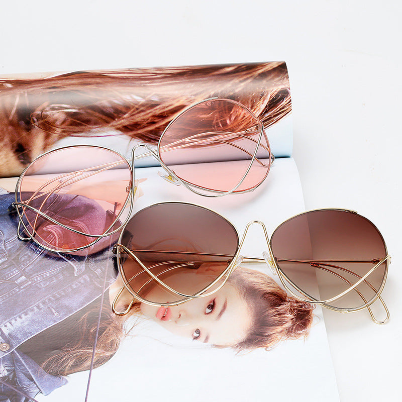 Ladies' fashion half-frame glasses with intricate, minimalist design Kalsten