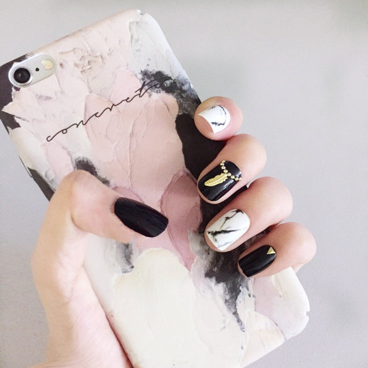 Artistic Press-On Nail Set with Geometric and Marble Patterns