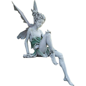 Kalsten | Statue of sitting fairy in the garden