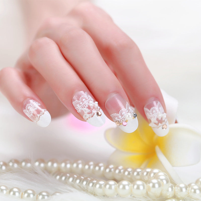 Elegant artificial nails with tip pattern and pearl embellishment Kalsten