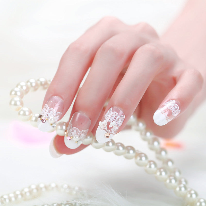 Elegant artificial nails with tip pattern and pearl embellishment Kalsten