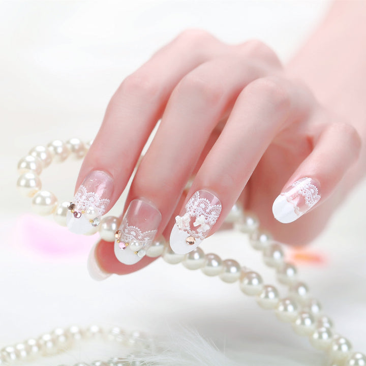 Elegant artificial nails with tip pattern and pearl embellishment Kalsten