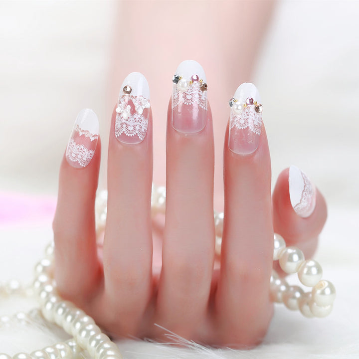 Elegant artificial nails with tip pattern and pearl embellishment Kalsten
