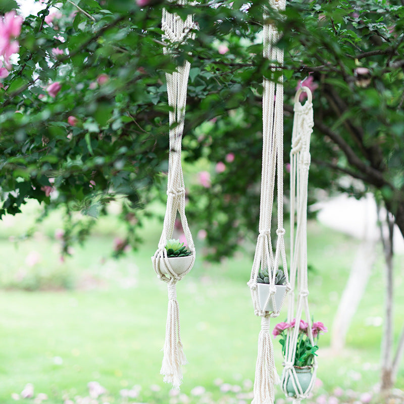 Macrame Plant Hanger Set made of cotton yarn hand-knotted with wooden ring and variable lengths