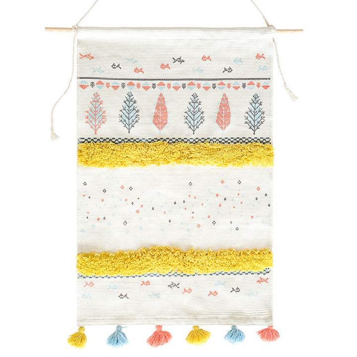Woven wall hanging with tufted stripes, embroidered leaves, and tassels