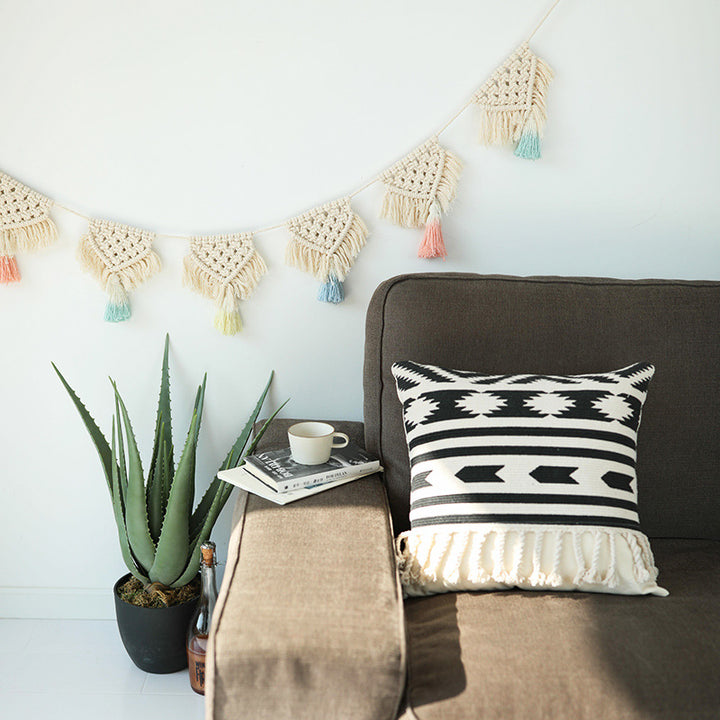 Macrame garland with hand-knotted triangle pendants and colorful cotton tassels