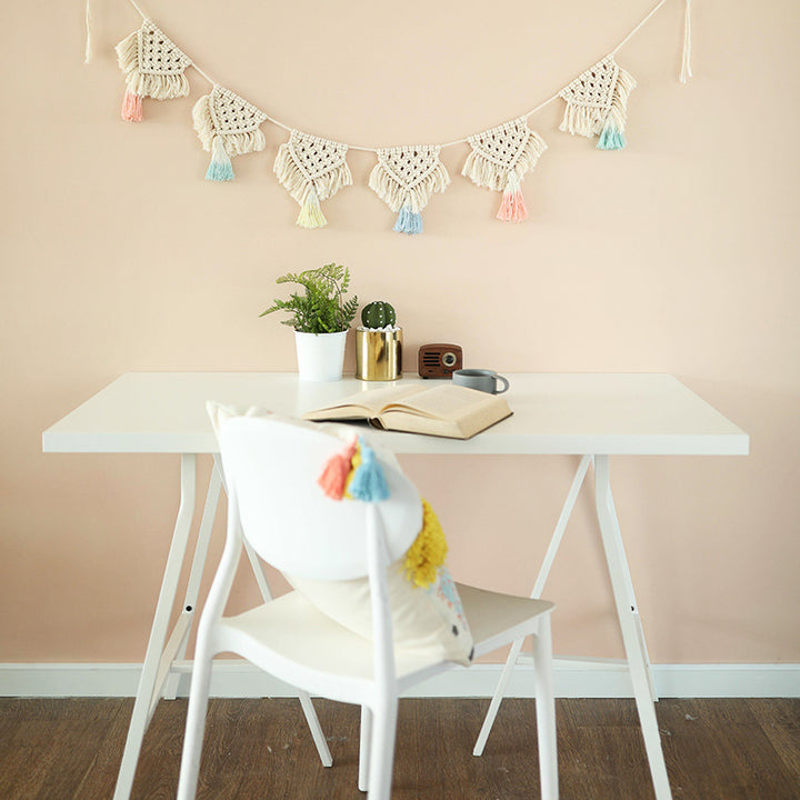 Macrame garland with hand-knotted triangle pendants and colorful cotton tassels